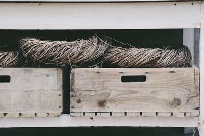 Close-up of ropes on wooden wall