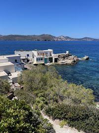 Scenic view of sea against clear blue sky