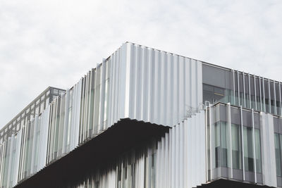 Low angle view of modern building against sky