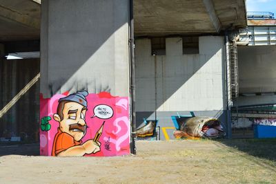 View of dog on graffiti wall