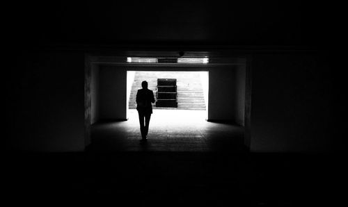 Woman walking in corridor