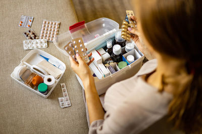 High angle view of woman working on table