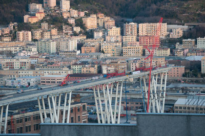 High angle view of bridge and buildings in city