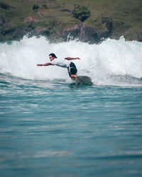 Man surfing in sea