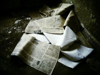 Close-up of paper fallen from wall