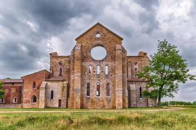 Low angle view of old building against sky