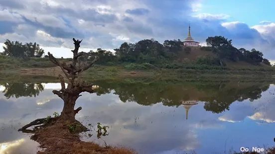 sky, reflection, water, tree, cloud - sky, lake, tranquility, cloud, tranquil scene, cloudy, nature, scenics, beauty in nature, built structure, religion, building exterior, spirituality, architecture, waterfront, standing water