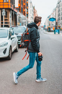 Young men walking over the street