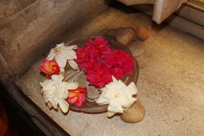 High angle view of pink roses on table