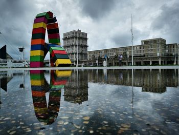 Reflection of buildings in lake