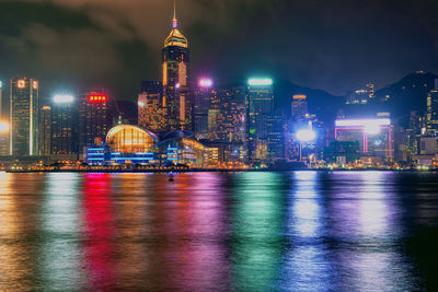 Illuminated buildings in city at night