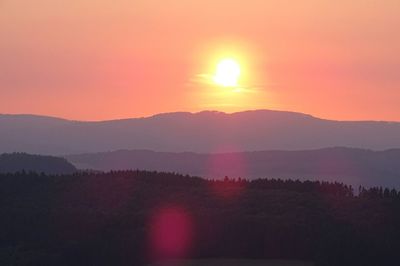 Scenic view of mountains at sunset