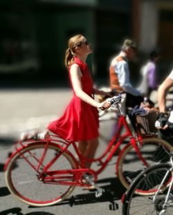 People on bicycle in city