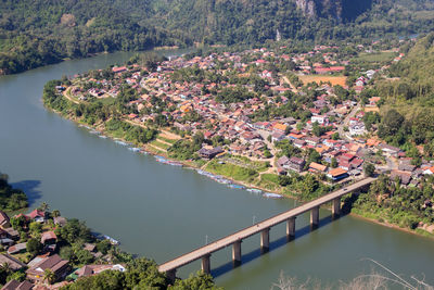 High angle view of river amidst townscape