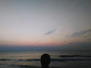 Silhouette of man on beach