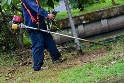 Low section of man working