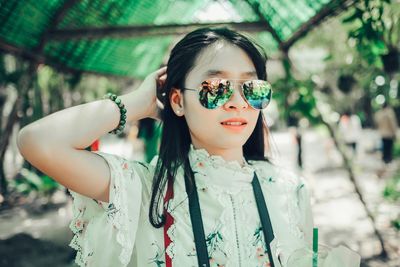 Portrait of girl wearing sunglasses