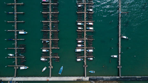 Boats moored in water