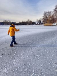 Woman walking in snow