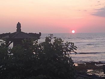 Scenic view of sea at sunset