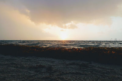 Scenic view of sea against sky during sunset
