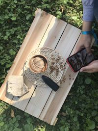 High angle view of hand holding basket