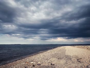 Scenic view of beach against sky