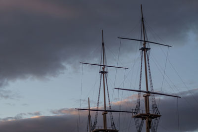 Low angle view of sailboat in sea against sky