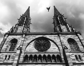 Low angle view of traditional building against sky