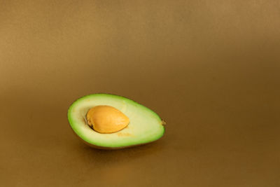 Close-up of fruit against white background