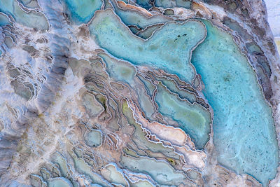 High angle view of rock formation in water