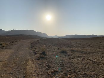Scenic view of desert against sky