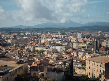 Aerial view of townscape against sky