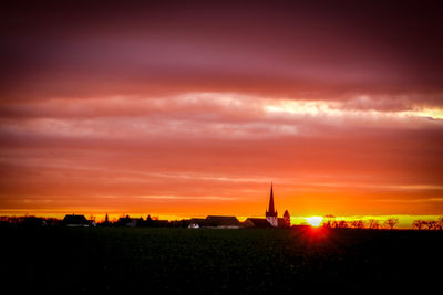 Scenic view of dramatic sky during sunset