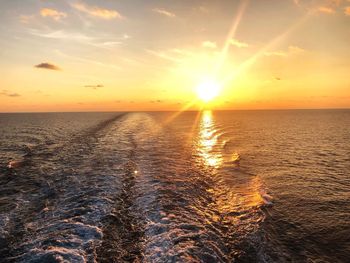 Scenic view of sea against sky during sunset