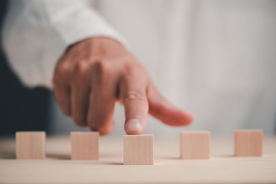 Close-up of baby hand with toy