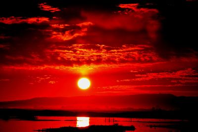 Scenic view of dramatic sky during sunset