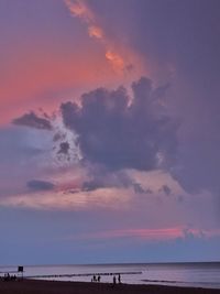 Scenic view of dramatic sky over sea during sunset