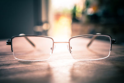 Close-up of sunglasses on table