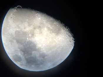 Low angle view of moon against sky at night