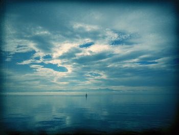 Scenic view of sea at sunset