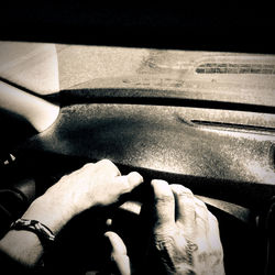 Close-up of man driving car