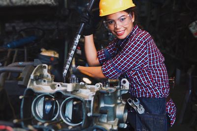 Engineering woman working at factory, working woman concept.