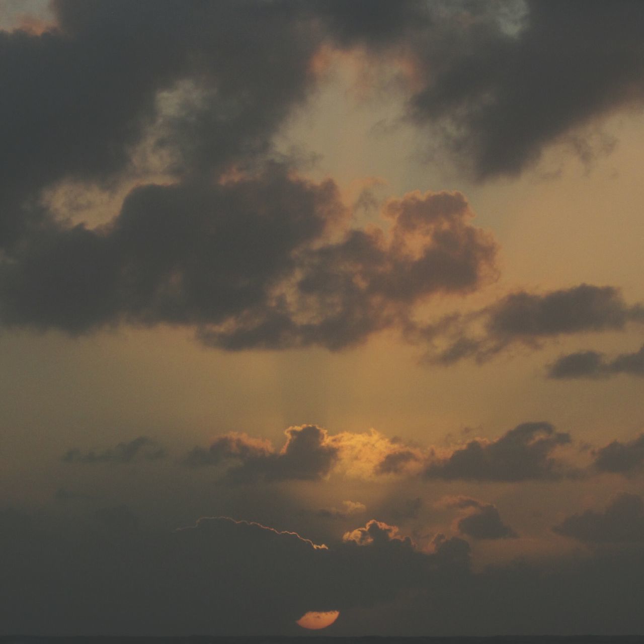 cloud - sky, sky, beauty in nature, nature, scenics, no people, cloudscape, outdoors, tranquility, sunset, low angle view, tranquil scene, storm cloud, day