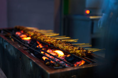 Close-up of bonfire on barbecue grill