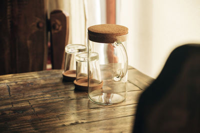 Close-up of glass jar on table