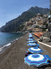 Panoramic view of beach against blue sky