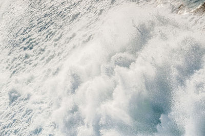 Sea waves splashing on shore