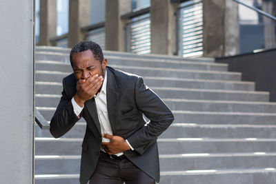 Young man using mobile phone