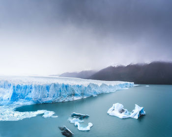 Scenic view of frozen sea against sky